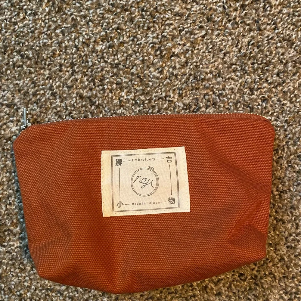 Cute Brown Pouch with Embroidered Design